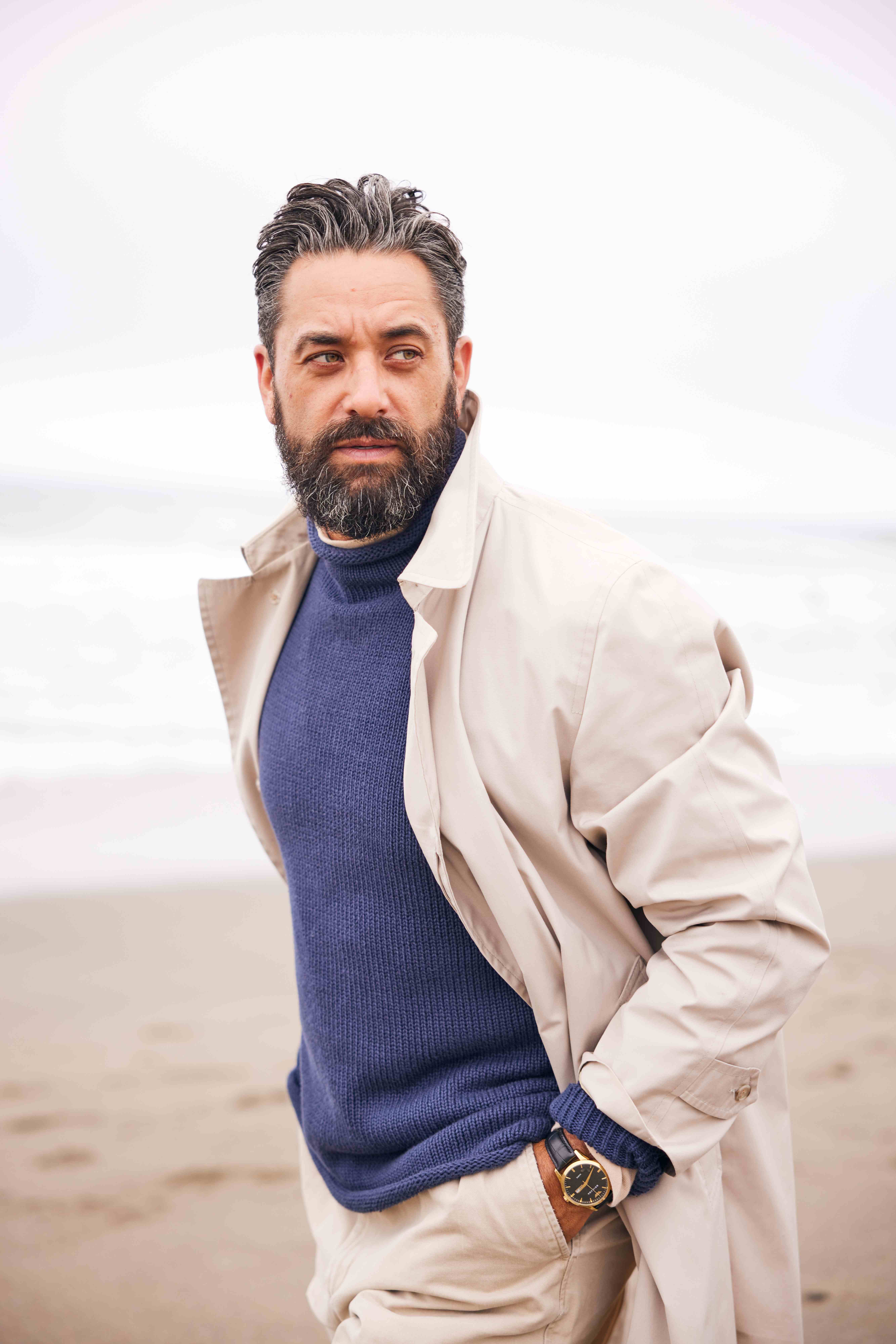 Mature male model in beige suit coastal photoshoot - authentic fashion modeling for lifestyle brands